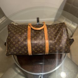 Louis Vuitton Keepall Bandoulière 55 Duffle Bag