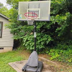 Spalding 54-Inch Portable Basketball Hoop with Shatter-Proof Polycarbonate Backboard