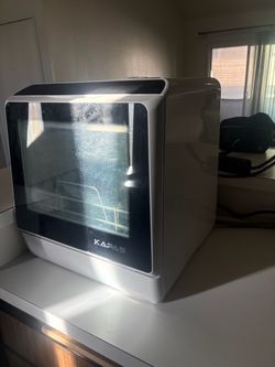 Counter top dishwasher