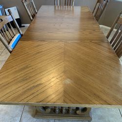 Solid Wood Table And Oak Chairs  