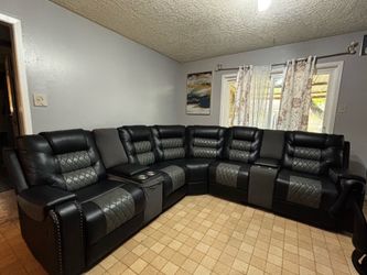 Black synthetic leather seccional sofa