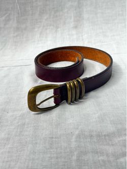 Leather belt with brass buckle