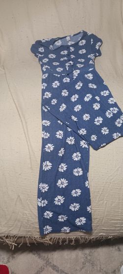 Blue daisy print button front wide leg jump suit with waist tie