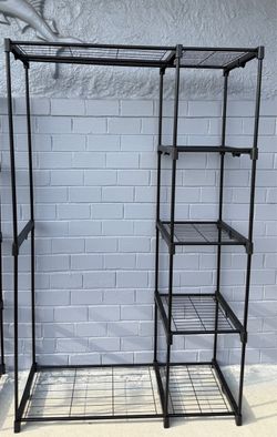 Black metal shelves with hanging rack