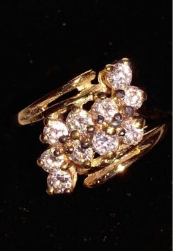 Woman’s diamond cocktail ring set in 14k yellow gold