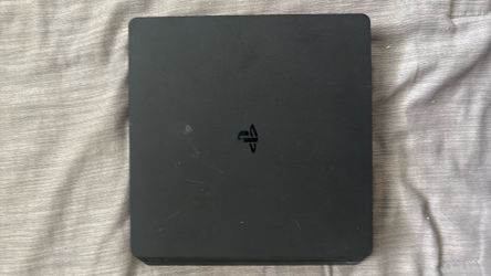 PS4 and two controllers