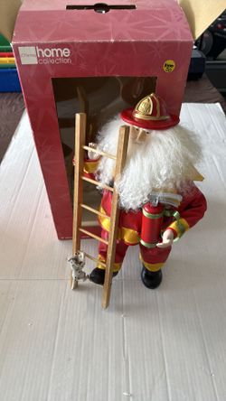 Santa with ladder, dog and fire extinguisher decor