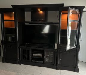 Entertainment Center with dimming lights. There’s a 60” on it now but has room for a bigger tv. $500 OBO.