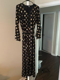 Women’s black with gold print dress. Excellent condition