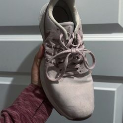 Pink Nike running shoes