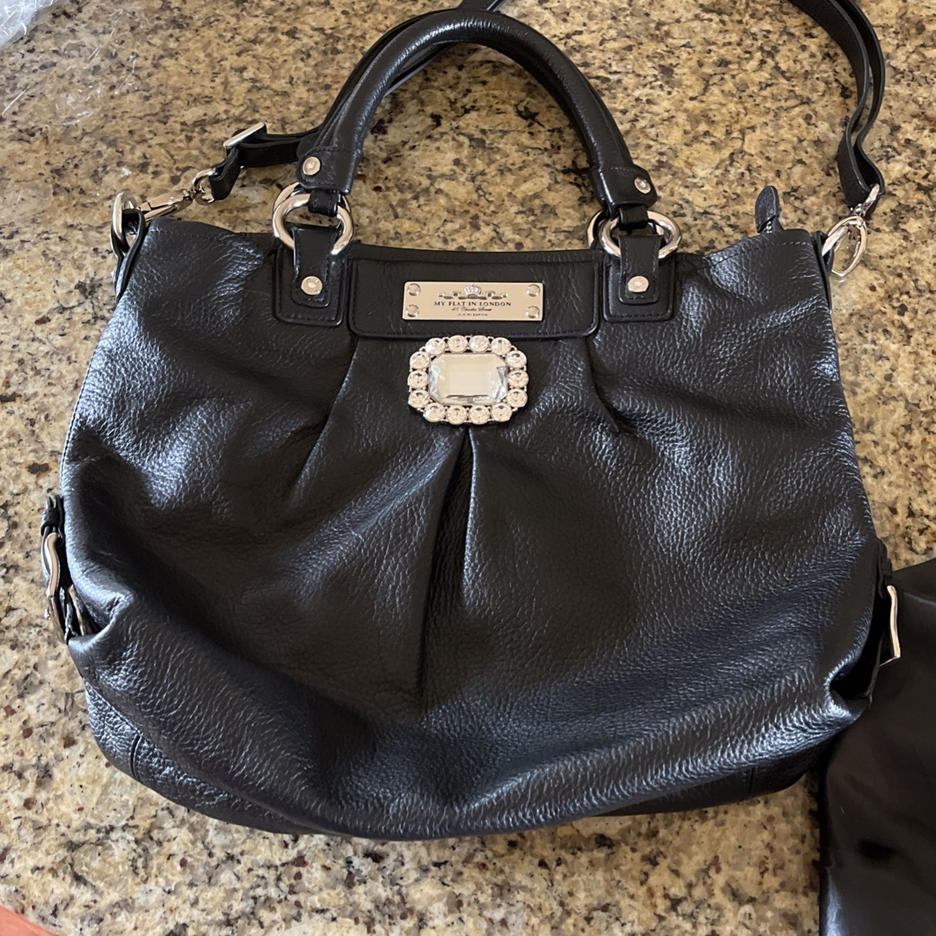 Black Leather purse..My flat In London 48 Charles street Jan Haedrich Purse