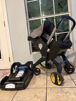Fiona car seat/ stroller and base
