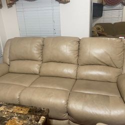 Two Tan Leather Sofas