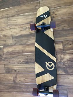 Black and wooden quest longboard