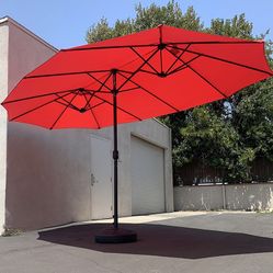 $130 (New in box) Large 15ft double sided outdoor umbrella w/ 65 lbs plastic weight base (red/gray) 