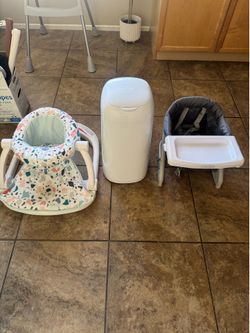 Two chairs and diaper dispenser
