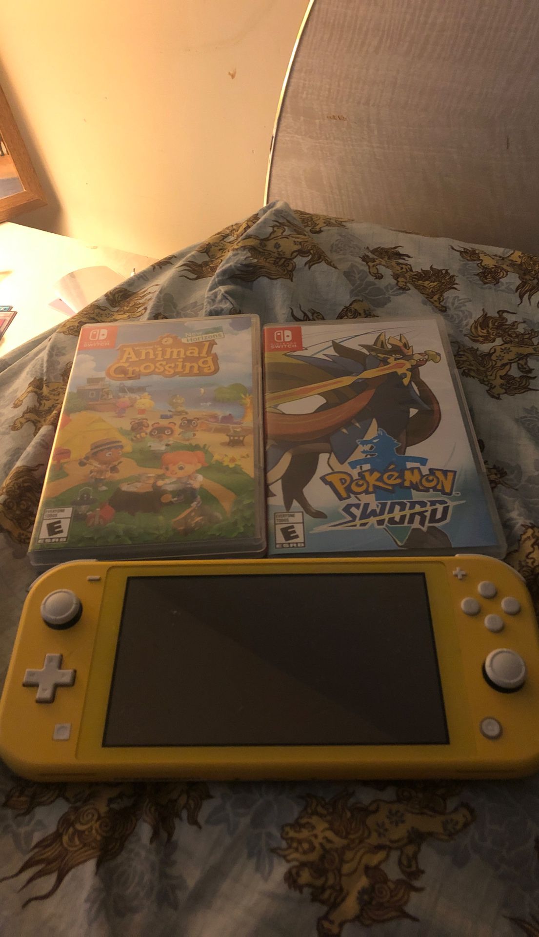 Nintendo switch lite with 2 games