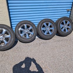Four Hankook tires and Ford F150 wheels