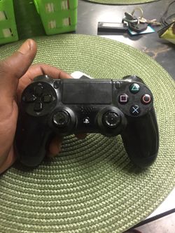 PS4 controller ha wear and tear but every button works and holds a nice charge