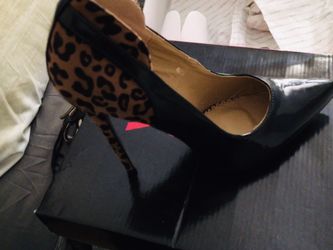 Patent leather front and side mixed, leopard print back. Sz 9