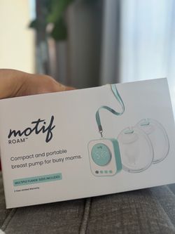 Portable breast pump