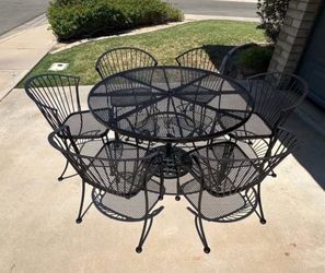 Patio set. Table and chairs. Carolina Iron. Very nice.