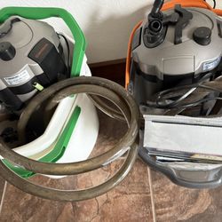 Two Marineland C220 canister aquarium filters plus extra media