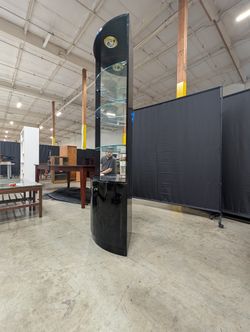Glossy Black Curved Display Cabinet with Illuminated Glass Shelves