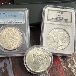 3x Genuine Silver dollars: 1x 1901-O MS63 PCGS Graded Morgan, 1922 Peace Dollar NGC MS63, Loose 1923 Peace Dollar