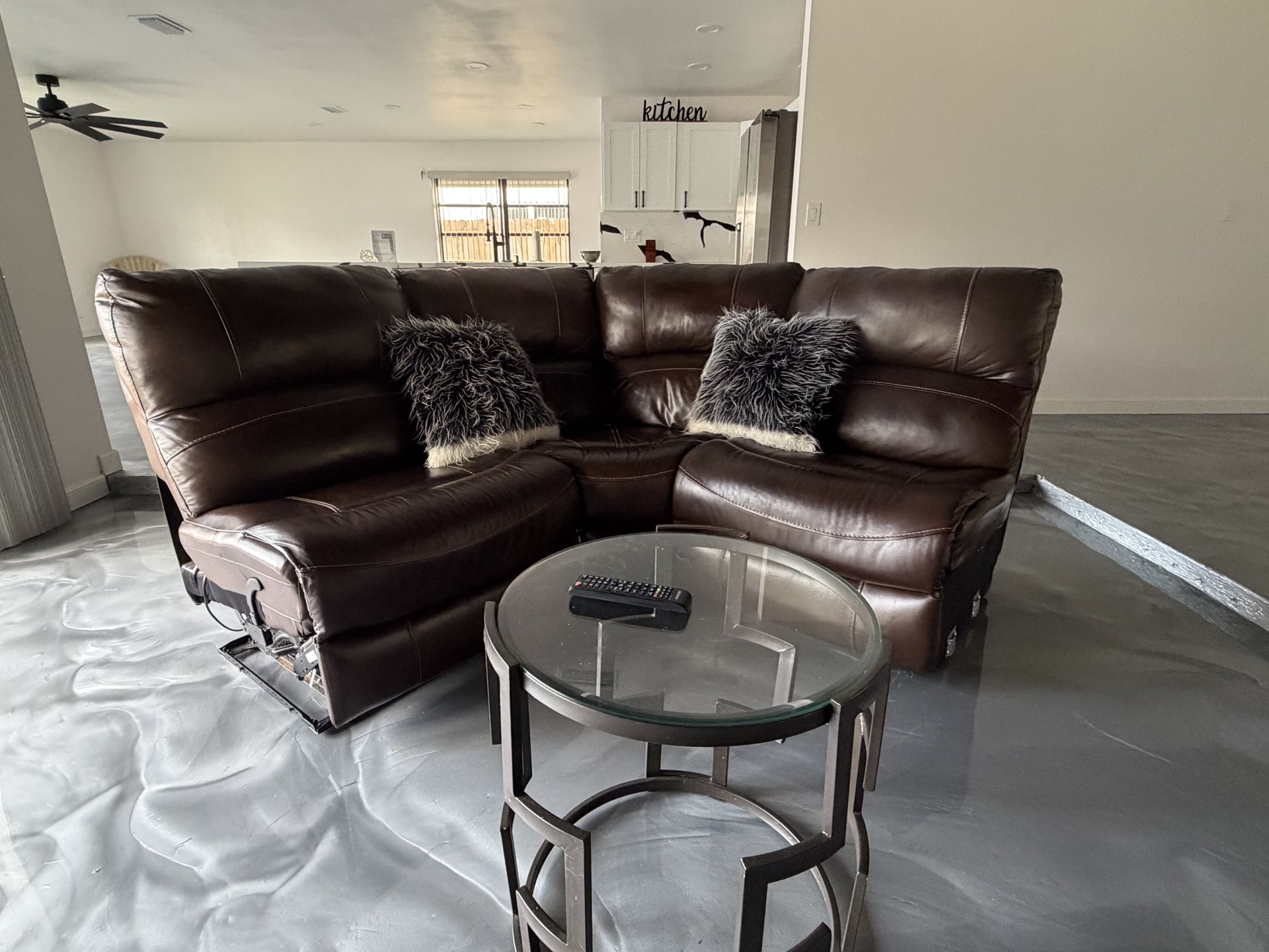 Brown couch part of sectional