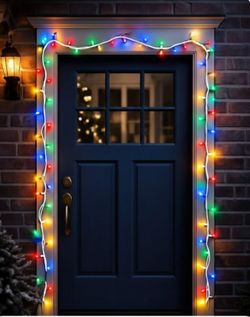 FESTIVE GARLAND WITH MULTICOLORED LIGHTS. 290" LONG. EACH BULB  2" LONG. LIKE NEW.