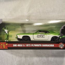 JADA METAL DIECAST CAR 1:32 SCALE.  MARVEL THE SAVAGE SHE HULK.  1973 PLYMOUTH BARRACUDA AND SHE HULK METAL DIECAST FIGURE. 