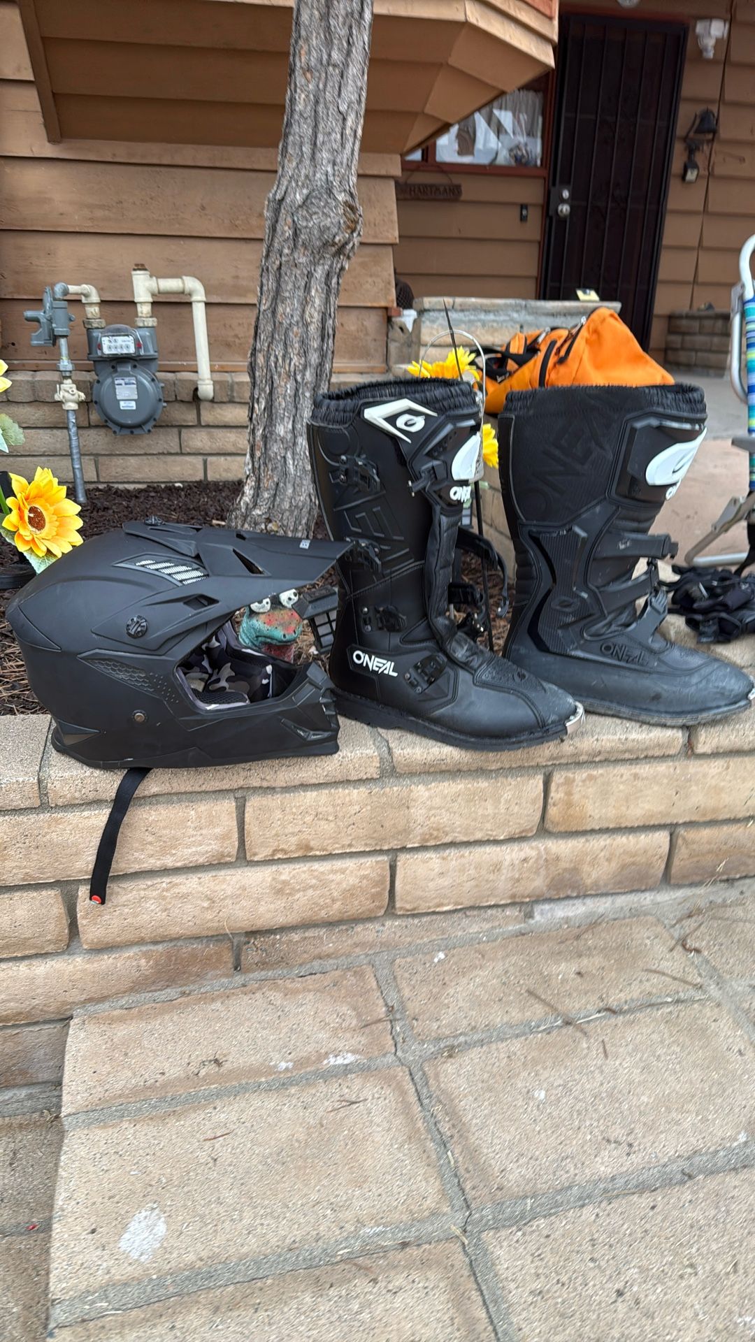 Motorcycle gear, KTM pants and shirt O’Neill boots helmet