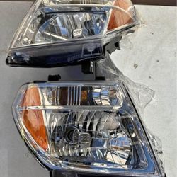 05-08 Nissan Frontier|05-07 Nissan Pathfinder Headlights faros lights luces calaveras micas