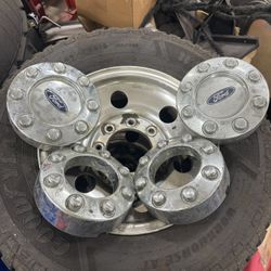 Good Year wrangler 245/75R16 tires on 8 lug f250 rims.  They where in the back of a truck I bought.  I never ran them.  They all seem to have even wea