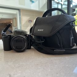 Sony ZV-E10 Mirrorless Camera w/ Microphone Cover, Case, and Lens Cover