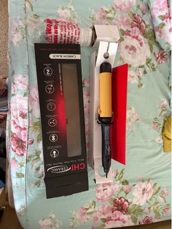 CHI CURL IRON BRAND NEVER NEVER USED