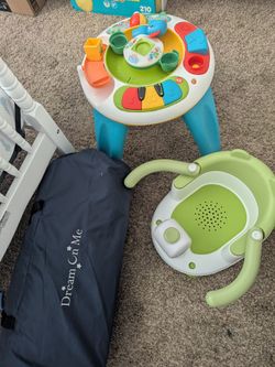 Dream On Me Portable Playard, bath chair and toys