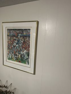 This is a limited edition 133/1500 lithograph print by artist Sanford Holien of Seattle Seahawks player Steve Largent. 