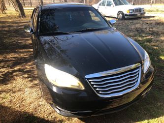 Crystler 200 real nice black leather and nice wheels too