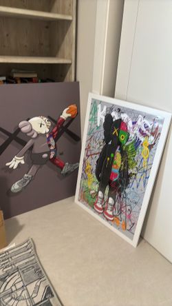 One canvas and one print in frame KAWS