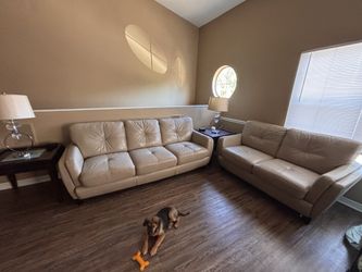 4-piece living room set: beige real leather, sofa, loveseat, and two side tables.