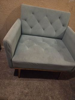 Tufted Velvet Loveseat Sofa with golden legs.  Accent chair