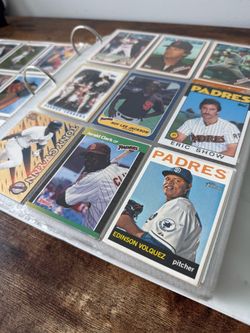 Binder with Collection of Baseball, Basketball, and Hockey
