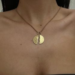 Brand new 18CT Solid Gold Italian designed pendant.  is a beautiful rare find and one of a kind. It has never been worn and both halves are complete. 