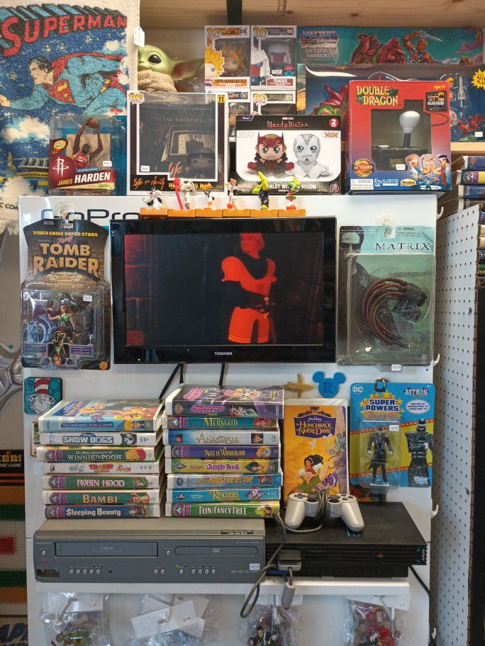Comic Book, Action Figures, And VHS 