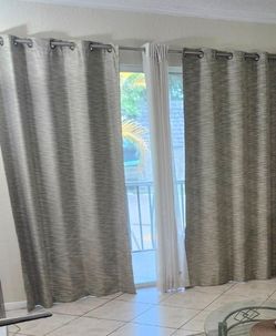 1- Pair of Blackout Drapes 52x84in long $6.00