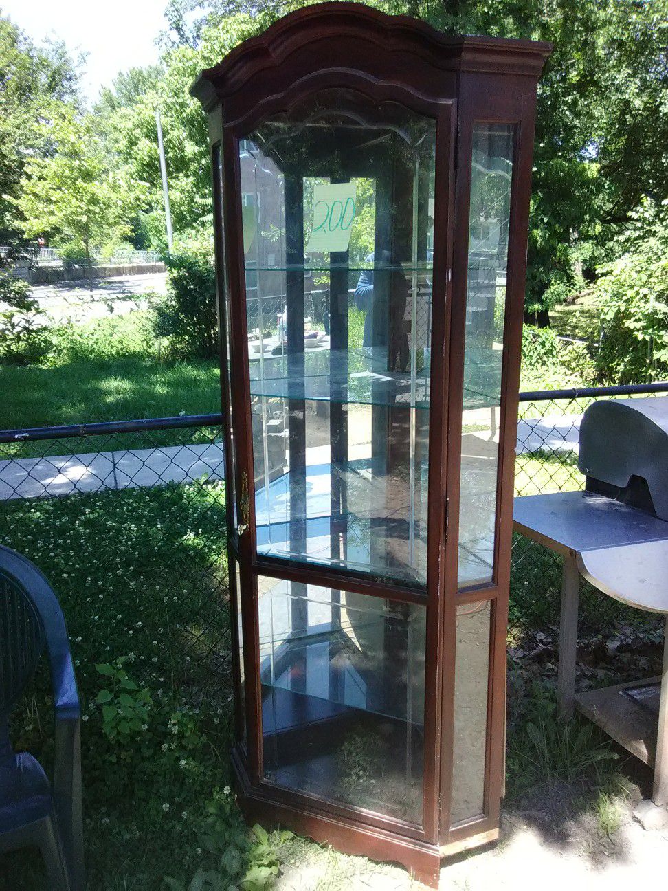 7' Corner curio cabinet with light and glass shelves