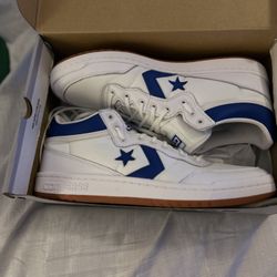 White Converse With Blue Trim