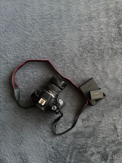 Black Canon EOSR100 With Kit Lens 18-45mm